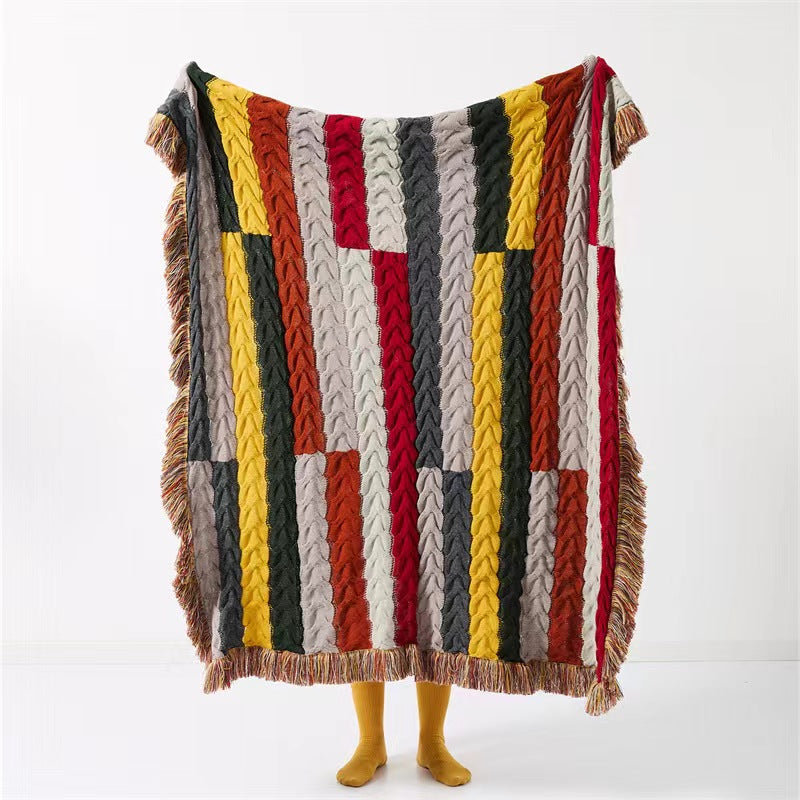Couverture tricotée Boho Twist avec pompons